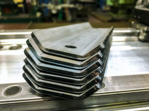 bending sheet metal with a hydraulic machine at the factory